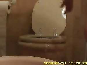 NOT My momma in toilet washing pussy. Hidden cam