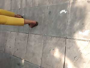 walking attractive mature butt yellow pant